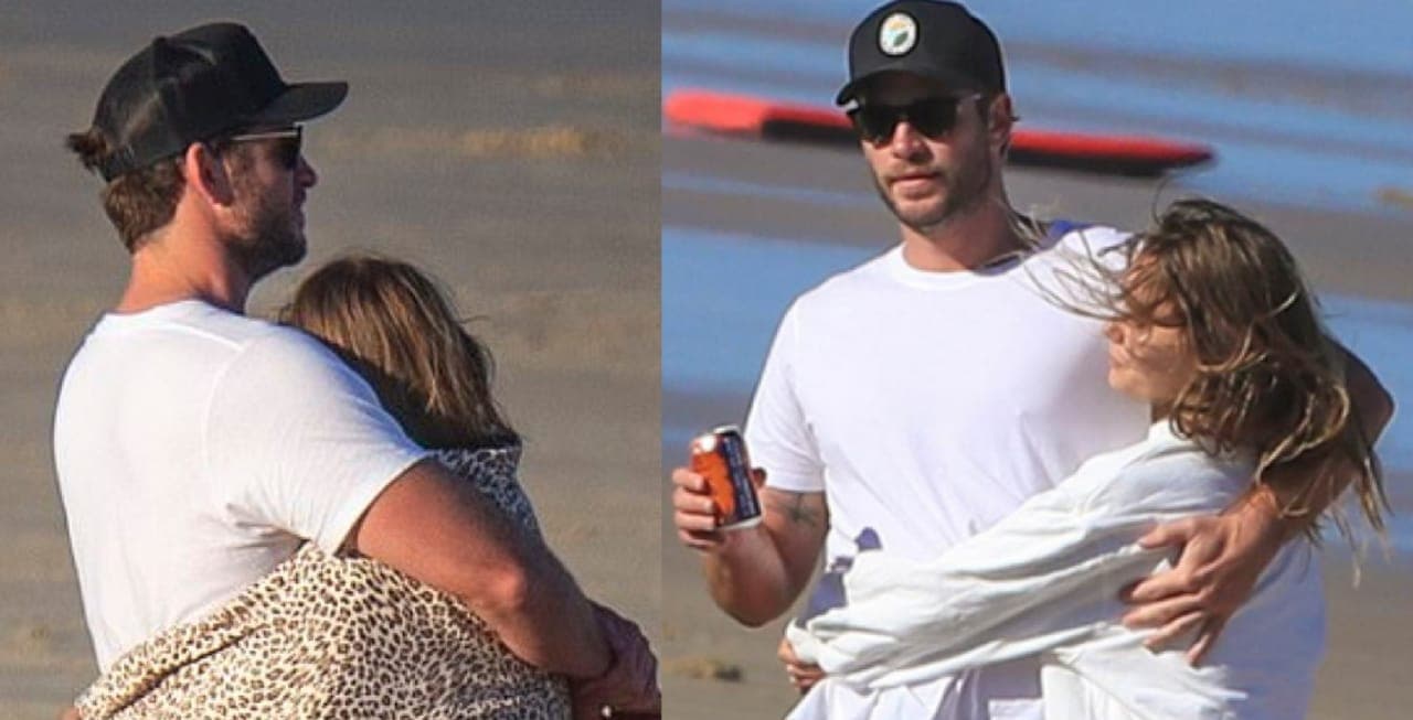 Liam Hemsworth es captado con su novia en la playa de Byron Bay